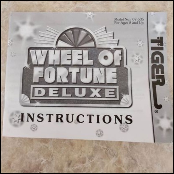 Wheel of Fortune “deluxe” handheld electronic game - Picture 10 of 10